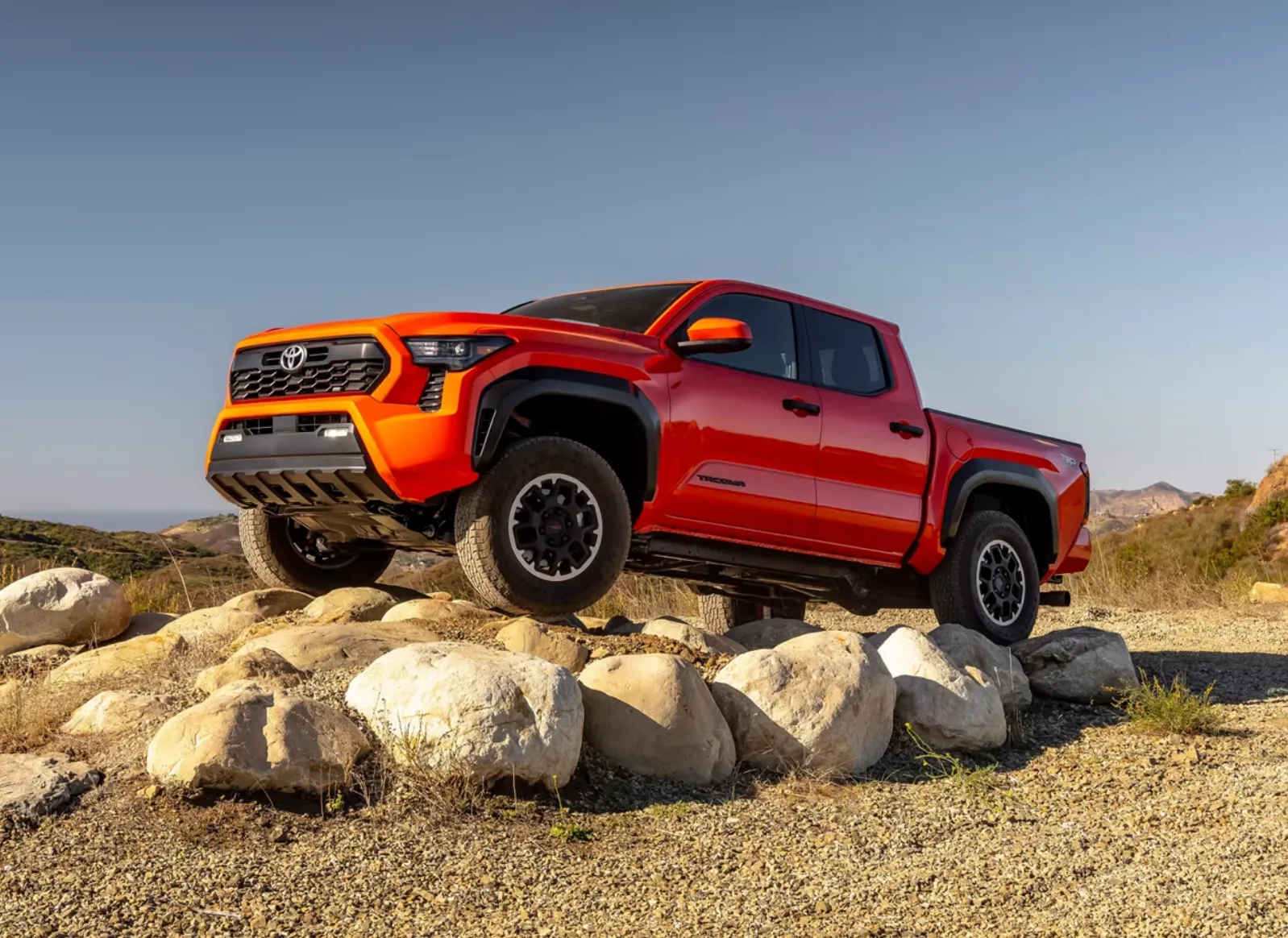 Toyota Tacoma Features - Tacoma sitting on rocks outside